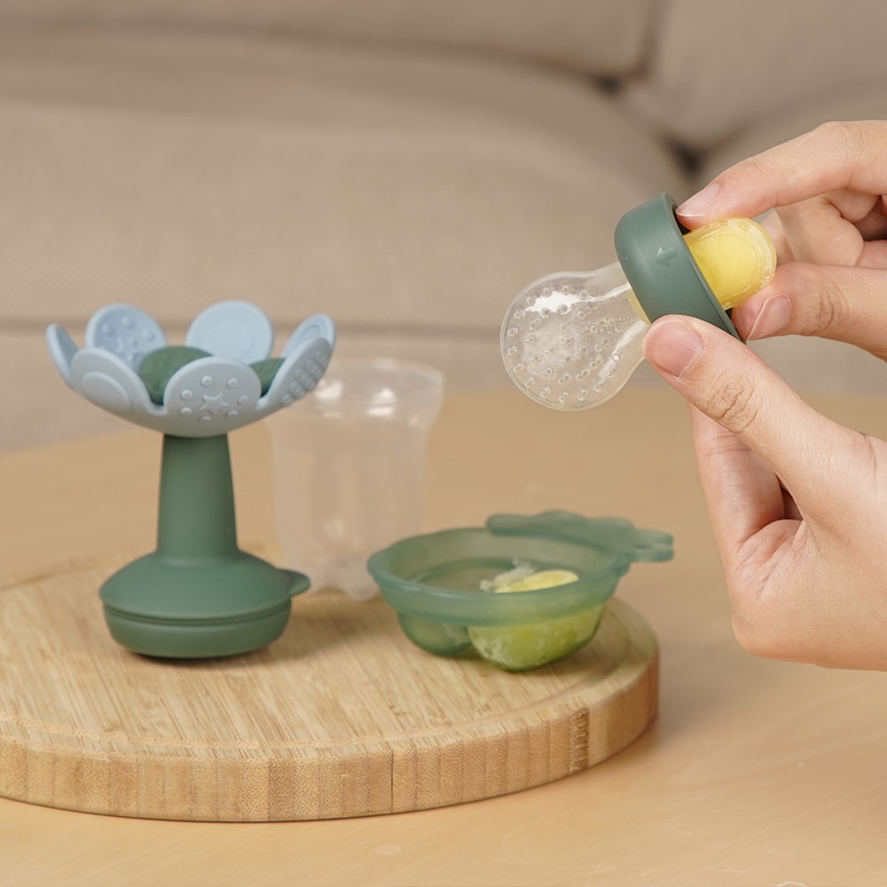 Alimentador anti-ahogo y mordedor flor con cubitera de HAAKAA