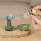 Alimentador anti-ahogo y mordedor flor con cubitera de HAAKAA