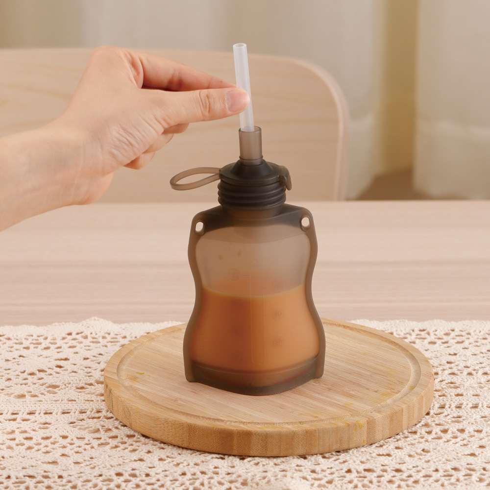 Conjunto de bolsa de armazenamento + bocal com fluxo regulável