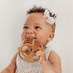 Mordedor de silicona Haakaa en forma de bola – Alivio para dientes y encías desde los primeros meses